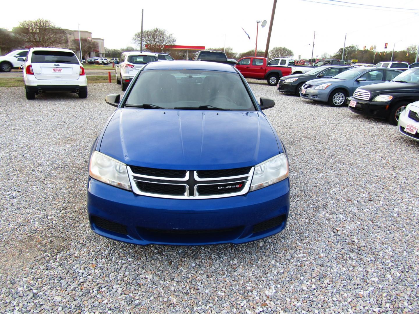 2012 Blue Dodge Avenger SE (1C3CDZAG6CN) with an 3.6L V6 DOHC 24V FFV engine, Automatic transmission, located at 15016 S Hwy 231, Midland City, AL, 36350, (334) 983-3001, 31.306210, -85.495277 - Photo#1